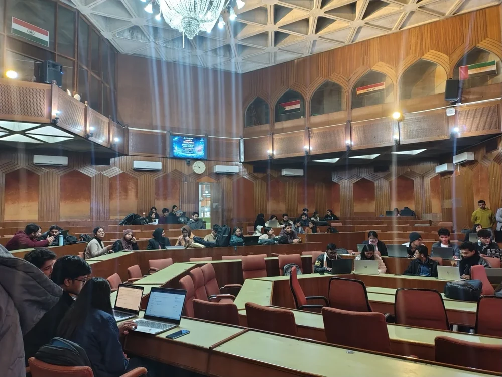A university auditorium filled with event attendees